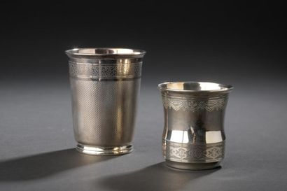 Set of two silver timpani, one with a guilloche...