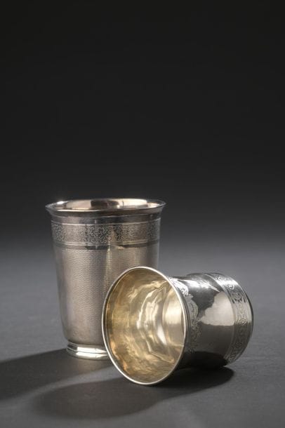 Set of two silver timpani, one with a guilloche...