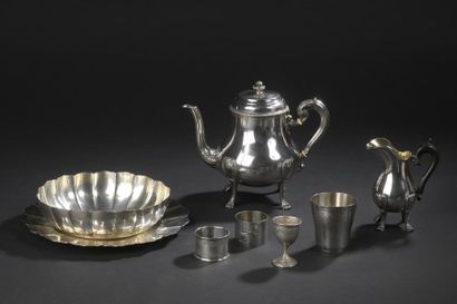Silver set including:
- Cup and its display...