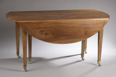 Table ovale à volets en bois naturel reposant...