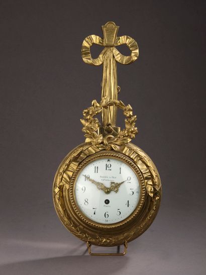 House BAGUÈS.

Chased and gilded bronze applique...