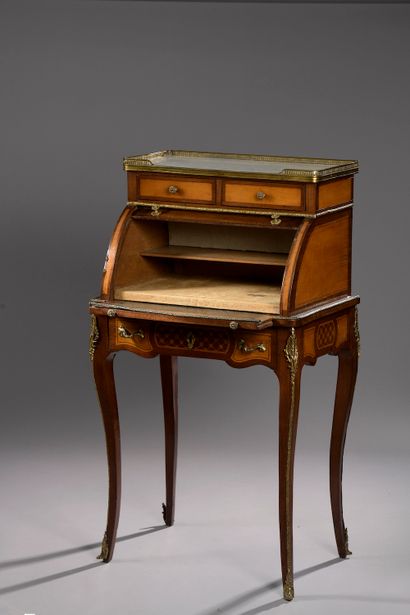 Lady's cylinder secretary in lemon wood veneer...