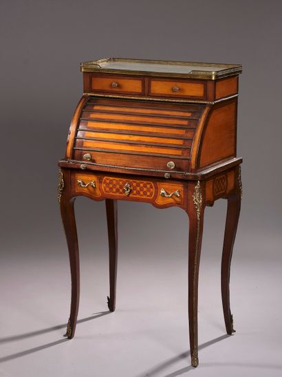 Lady's cylinder secretary in lemon wood veneer...
