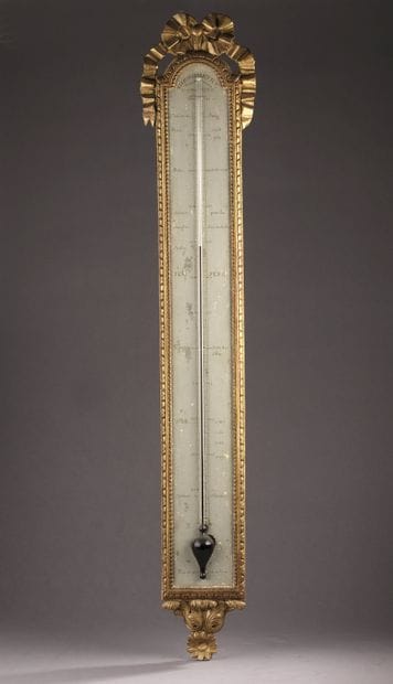 Carved and gilded wood thermometer according...