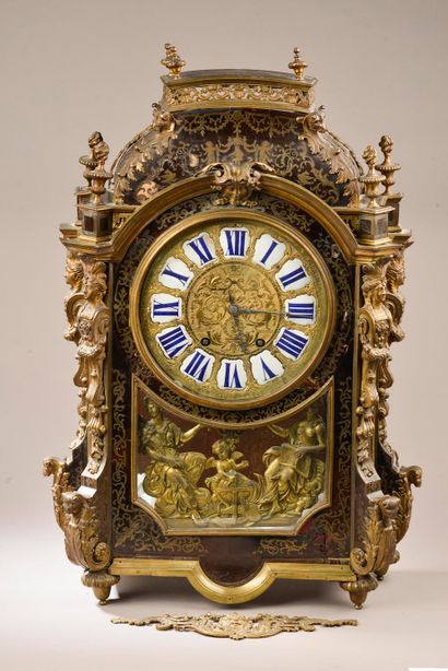 Religious clock in marquetry called 