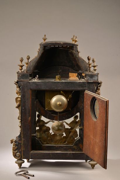 Religious clock in marquetry called 