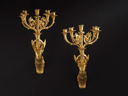 A suite of four finely chased and gilded...