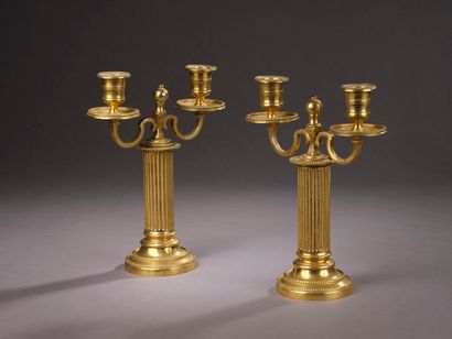 Pair of chased and gilded bronze torches...