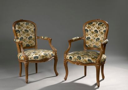Suite of four armchairs in moulded and carved...