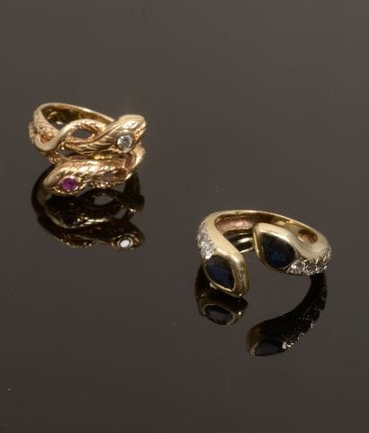 Set of two 14k yellow gold rings forming...