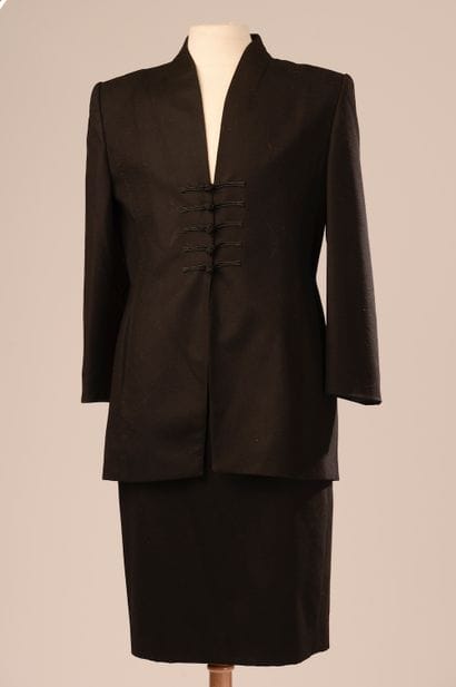GUY LAROCHE. 

 Skirt suit in black wool,...