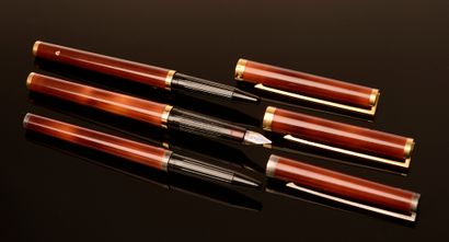 ST. DUPONT. 

 Set of three pens lacquered...