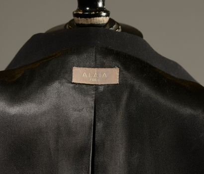 ALAÏA Paris.

Black cotton belted jacket,...