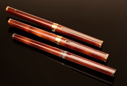 ST. DUPONT. 

 Set of three pens lacquered...