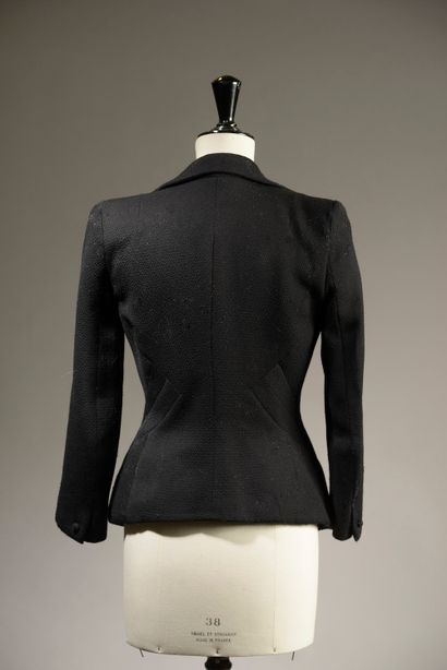 JOHN GALLIANO.

Belted black wool jacket,...