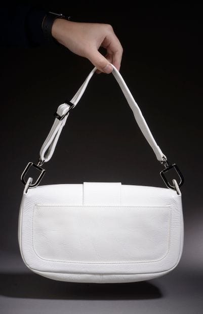 ROGER VIVIER.

Glazed white leather handbag,...
