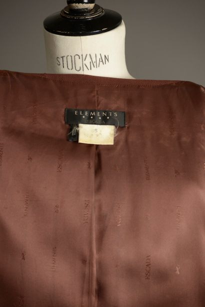 ESCADA Eléments.

Veste ceinturée en laine...