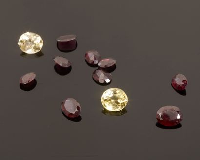 Set of two oval faceted yellow sapphires...