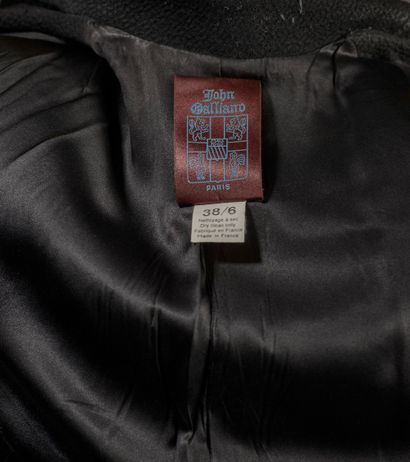 JOHN GALLIANO.

Belted black wool jacket,...