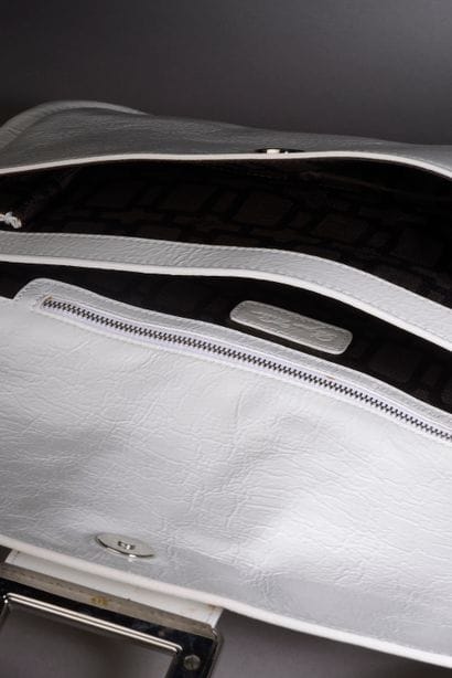 ROGER VIVIER.

Glazed white leather handbag,...