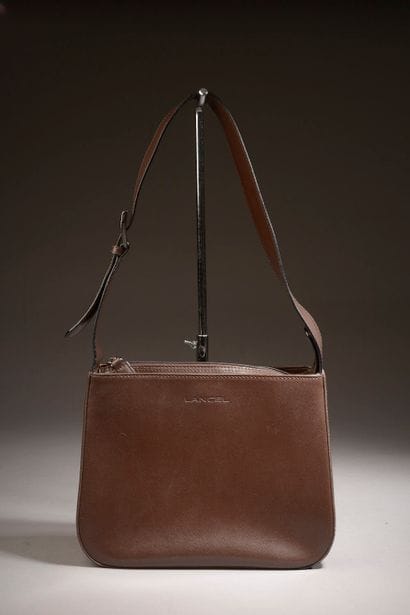 LANCEL. 

 Smooth brown calf leather handbag,...
