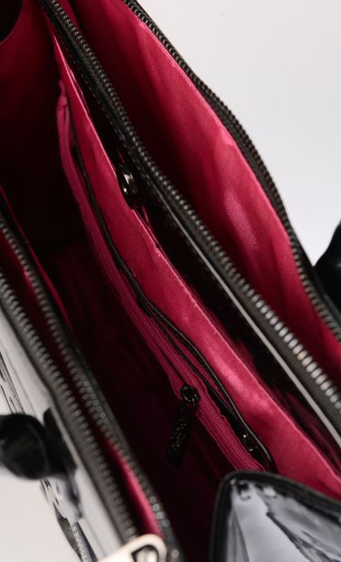 CHRISTIAN LACROIX. 

 Black patent leather...