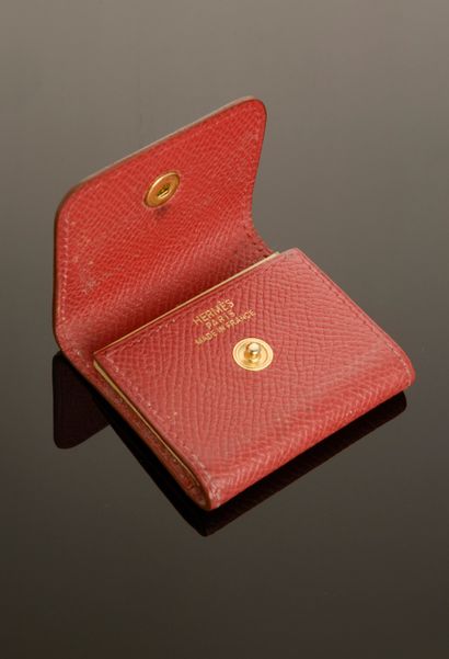 HERMÈS Paris.

Étui à post-it en cuir rouge...