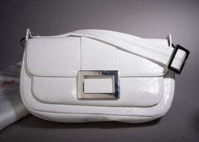 ROGER VIVIER.

Glazed white leather handbag,...
