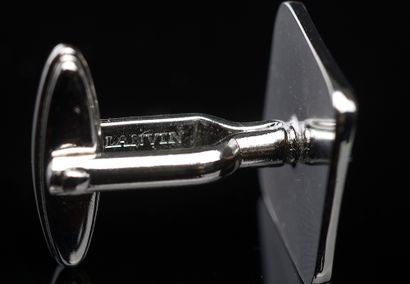 LANVIN.

Two pairs of silver-plated cufflinks:

-...