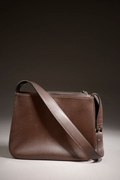 LANCEL. 

 Smooth brown calf leather handbag,...