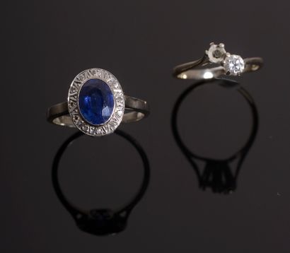 Set of two 18k white gold rings, one set...