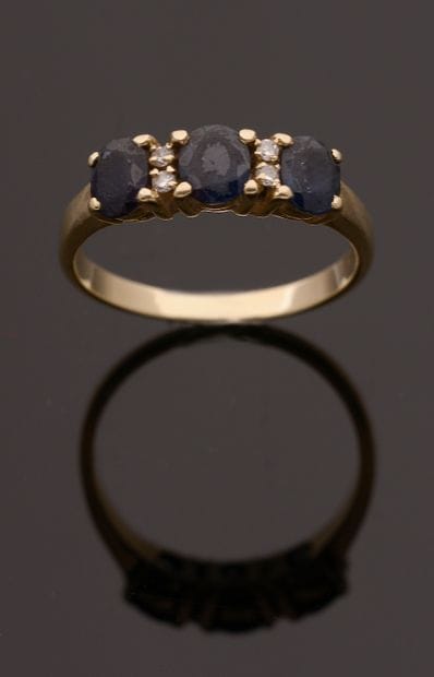 14k yellow gold ring set with three oval...