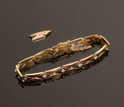 Bracelet en or jaune 14k à douze maillons...