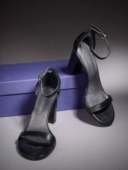 STUART WEITZMAN.

Pair of black leather sandals...