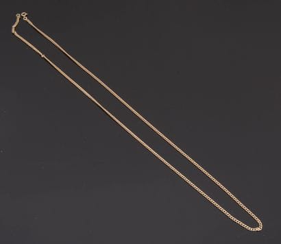 Chain in 18k yellow gold with filed curb...