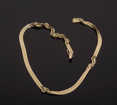 Necklace in 18k yellow gold with flat snake...