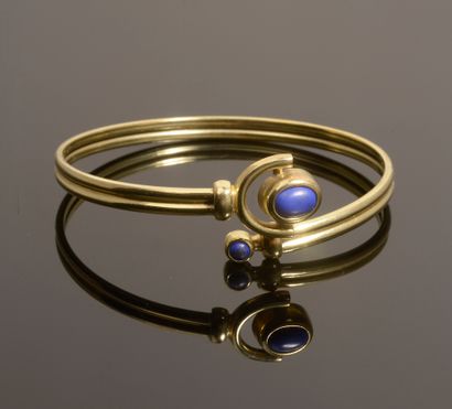 Bracelet jonc ouvrant en or jaune 14k orné...