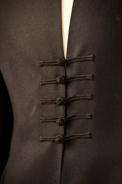 GUY LAROCHE. 

 Skirt suit in black wool,...
