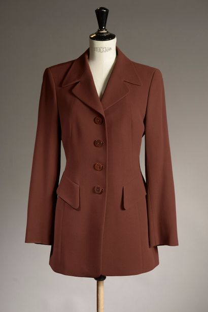 ESCADA Eléments.

Veste ceinturée en laine...