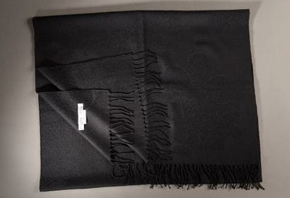 CHRISTIAN DIOR.

Black wool and silk fringed...
