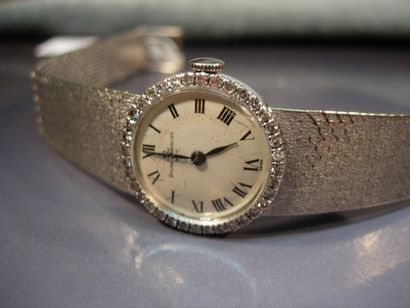 BAUME & MERCIER
Montre de dame en or gris,...