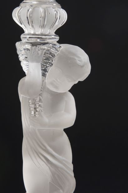 Pair of girandoles or torches in clear molded...