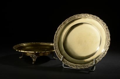 Pair of round display stands in gilded silver...