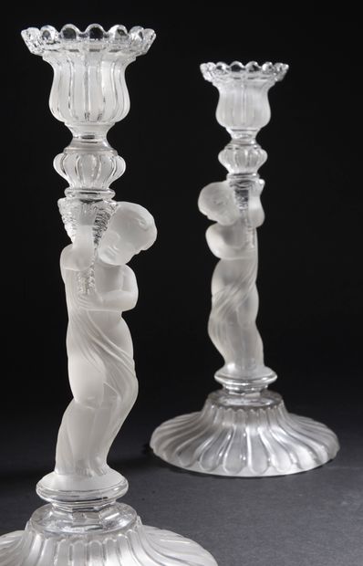 Pair of girandoles or torches in clear molded...