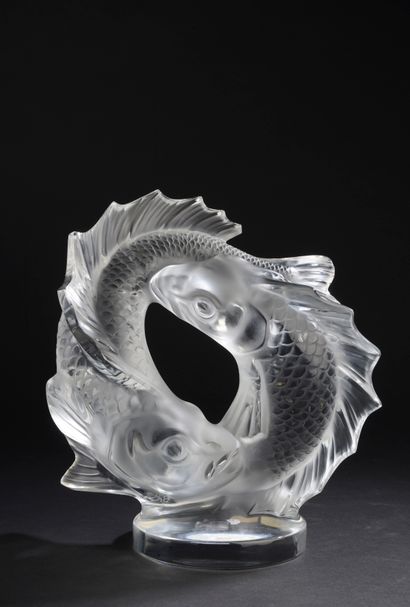 Group representing two fish in clear crystal...