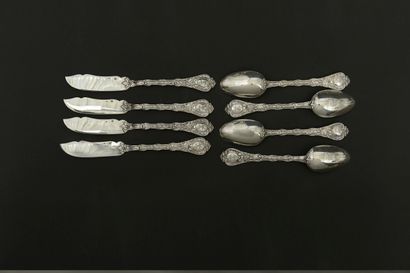 Twelve large spoons and twelve knives with...