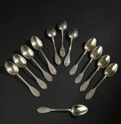 Twelve spoons with mocha out of silver 950...