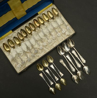 Twelve small spoons out of silver 800 thousandth,...