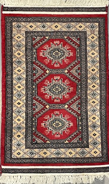 Rectangular carpet in polychrome wool with...