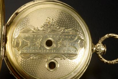 Montre de poche en or jaune 18K (démontée).
Poids...